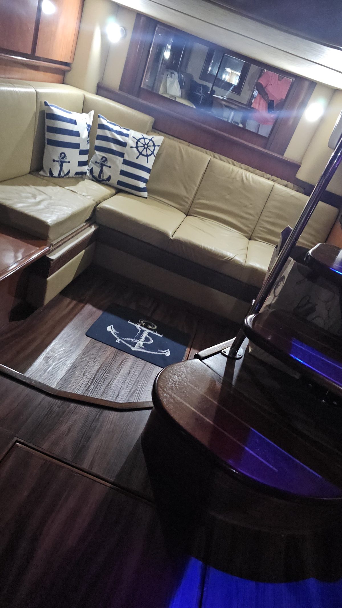 Sea Ray Sundancer salon seating with nautical pillows